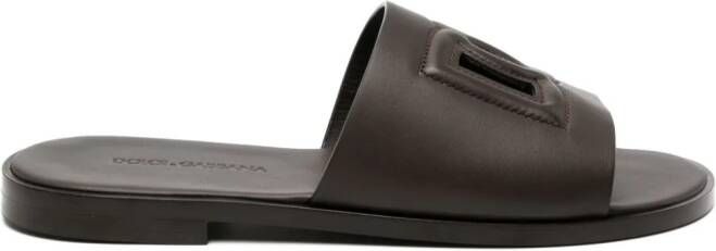 Dolce  Gabbana embossed-logo leather slides Brown
