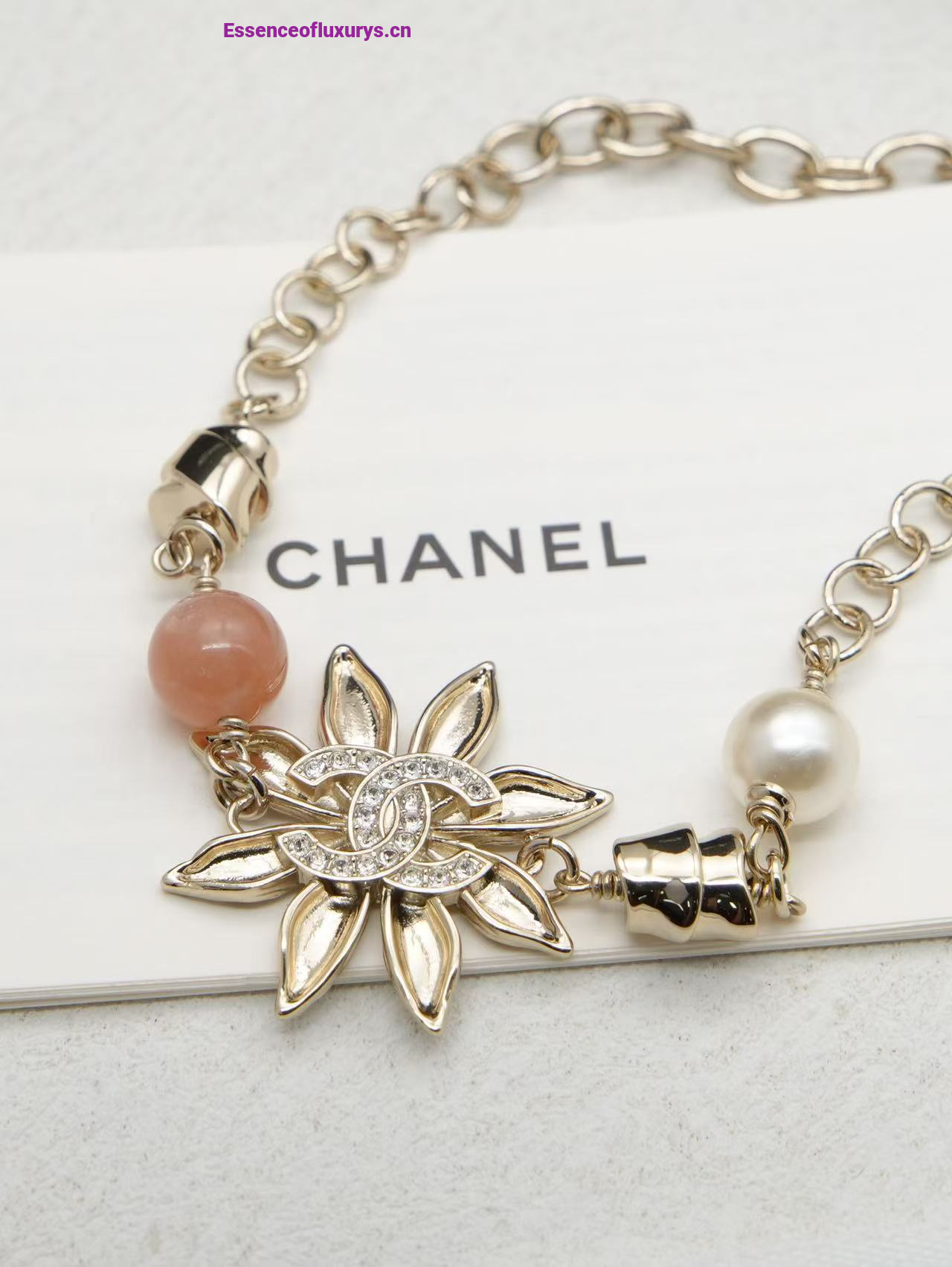 Chanel Gold Metal Flower Bracelets