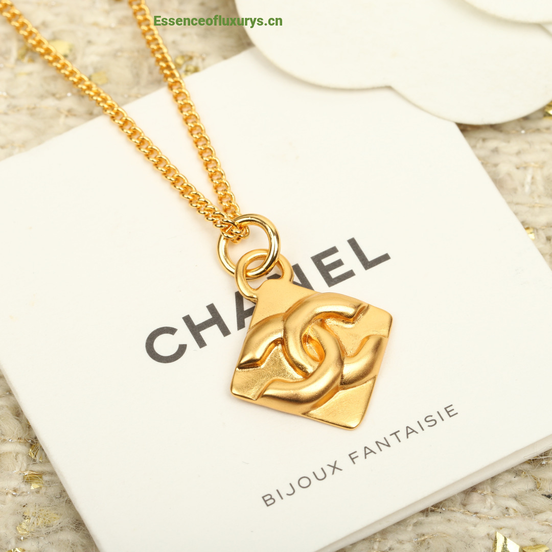 Chanel Gold Metal CC Logo Pendant Necklaces